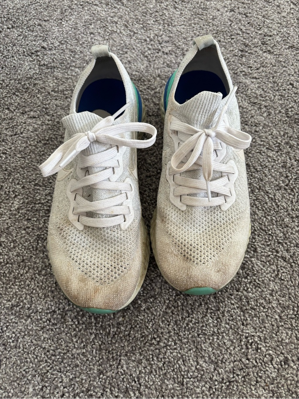 Nike Women's Light Gray Knit Running Shoes with Teal Accents